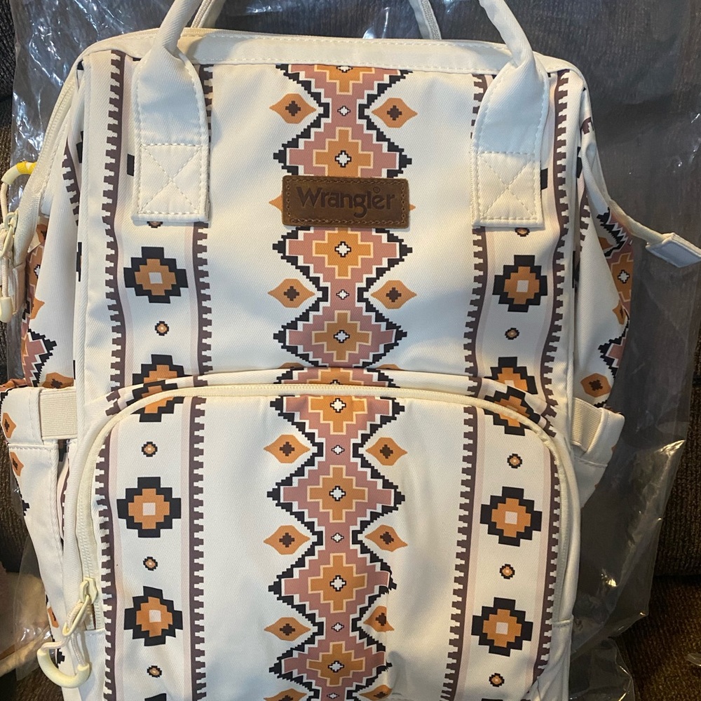 Highly sought Wrangler backpack in Tan.